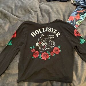 Hollister Black Long Sleeve with Red and Green Floral Panther Design
